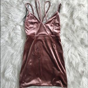 Tags still on velvet dress